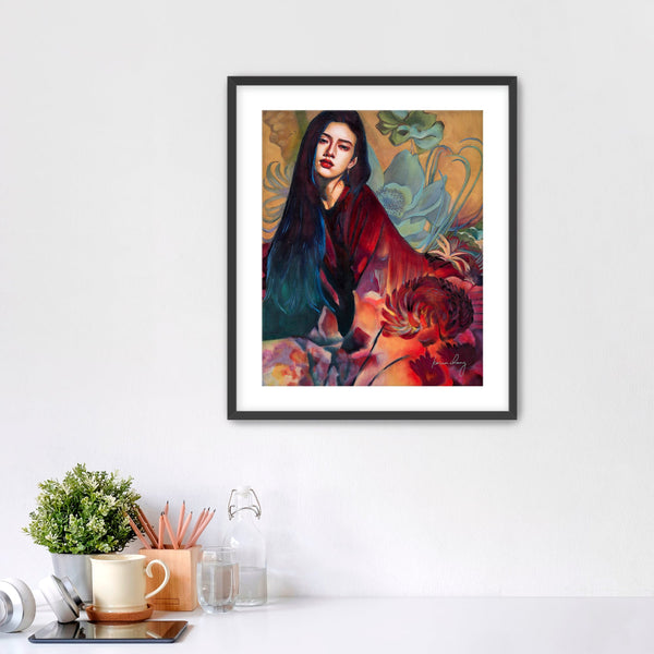 Framed artwork of a person with a colorful background on a white wall.