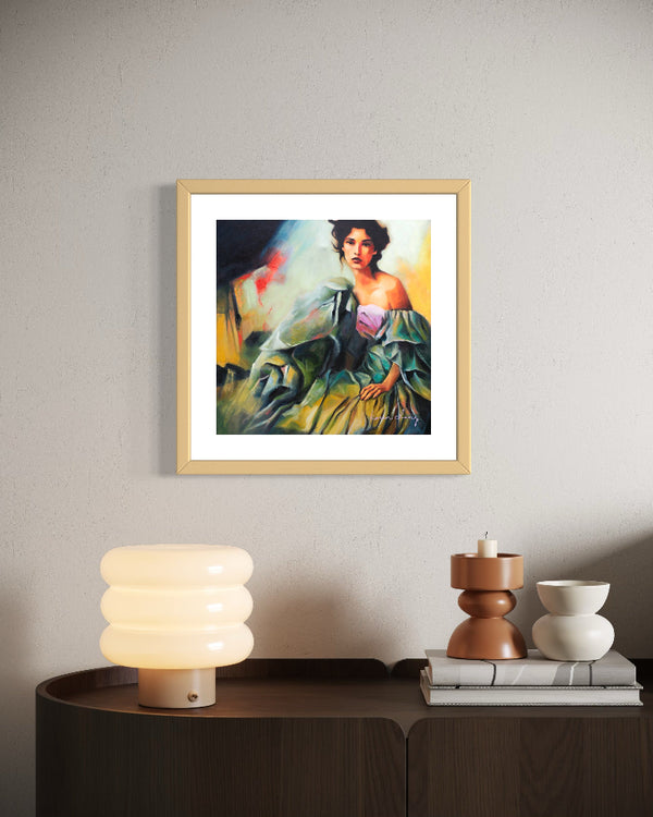 Framed painting of a woman on a wall above a side table with decorative items.
