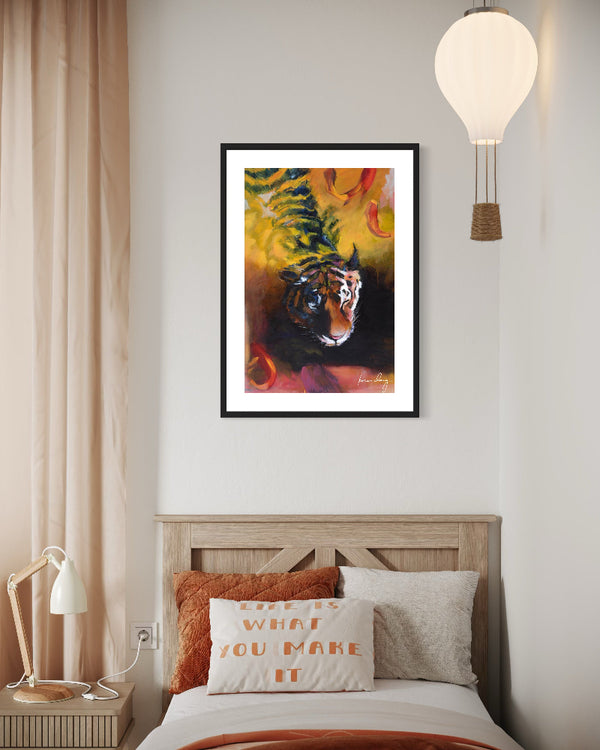 Framed painting of a tiger on a wall above a bed with decorative pillows.