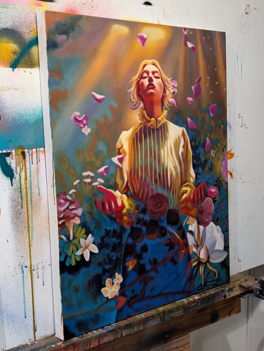 Colorful painting of a person with flowers and abstract elements on an easel.