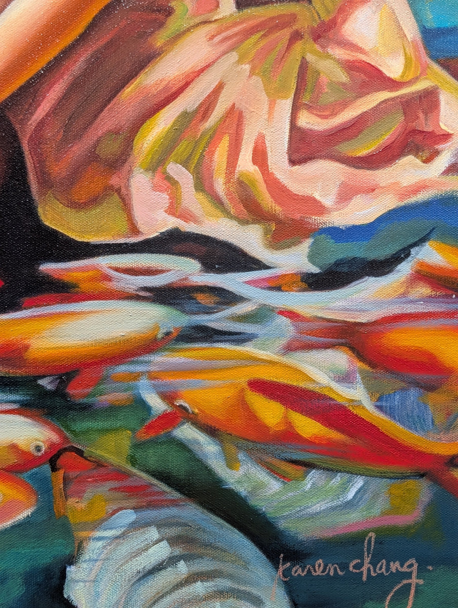 Colorful abstract painting of fish with a signature at the bottom right corner.