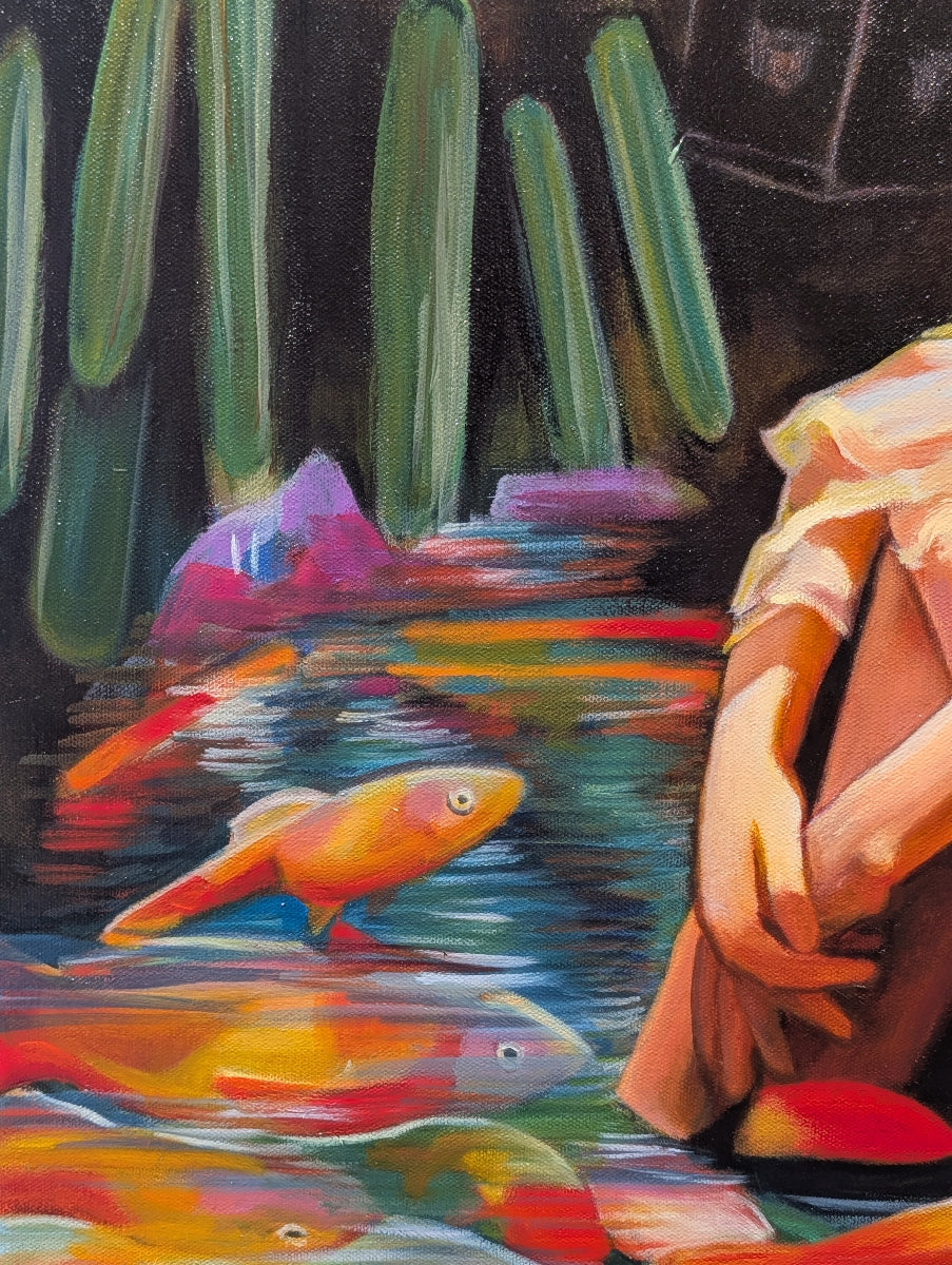 Colorful painting of fish and cacti with a person sitting on a rock.