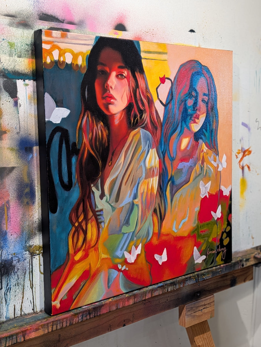 Colorful painting of two women on a textured wall with abstract elements.