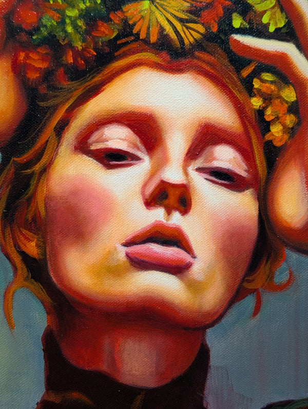 Close-up of a stylized face with floral crown and abstract background