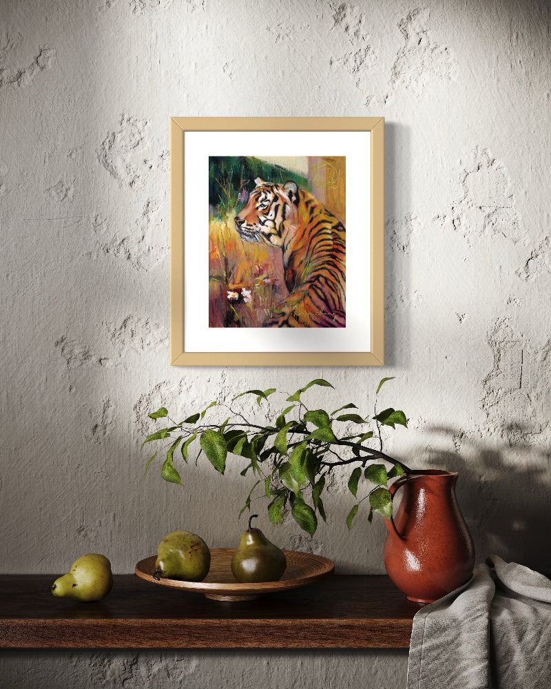 Framed painting of a tiger on a wall above a wooden shelf with pears and a plant.