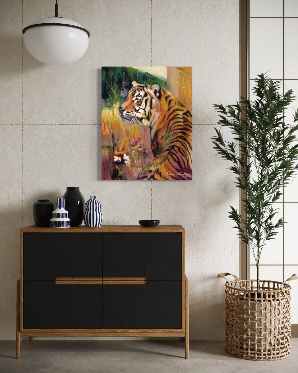 Modern interior with a black and wood dresser, decorative items, and a tiger painting on the wall.