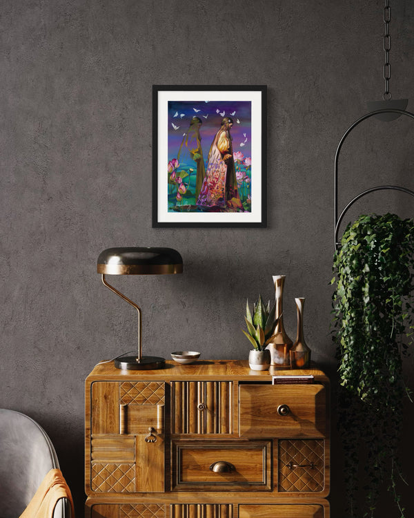 Framed artwork above a wooden cabinet with decorative items in a room.