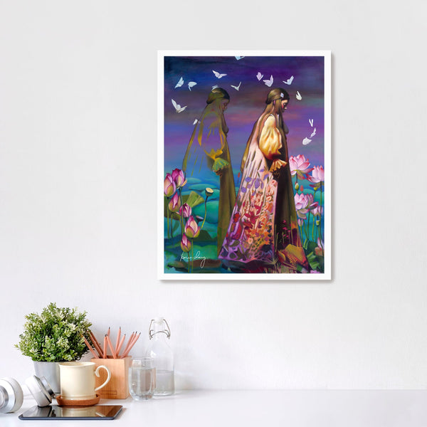 Framed artwork of two people in a garden with flowers and butterflies on a white wall.