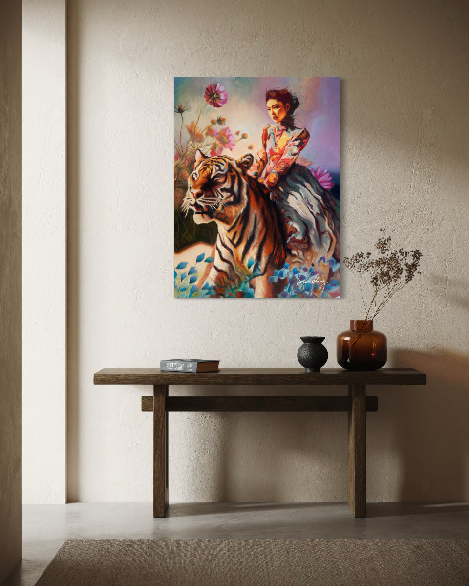 Painting of a woman riding a tiger on a wall above a wooden console table.