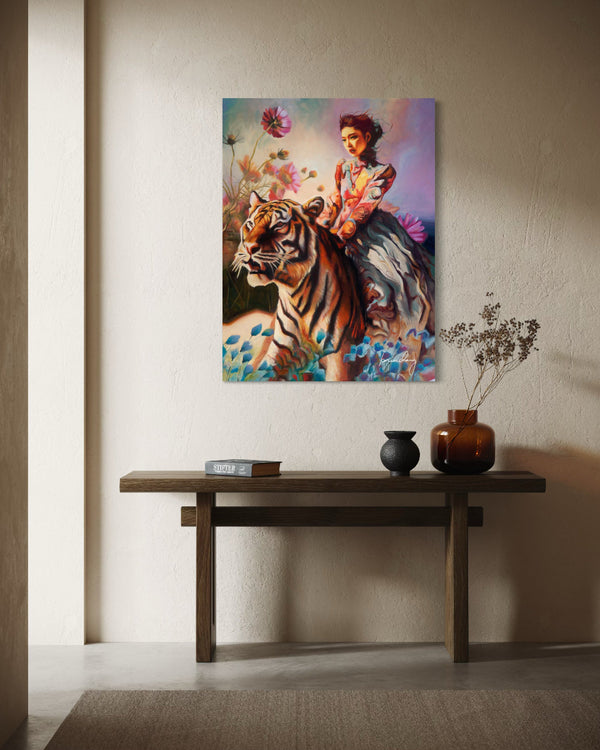 Painting of a woman riding a tiger on a wall above a wooden console table.