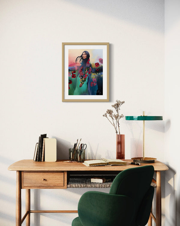 Modern home office with wooden desk, green chair, and framed artwork on the wall.