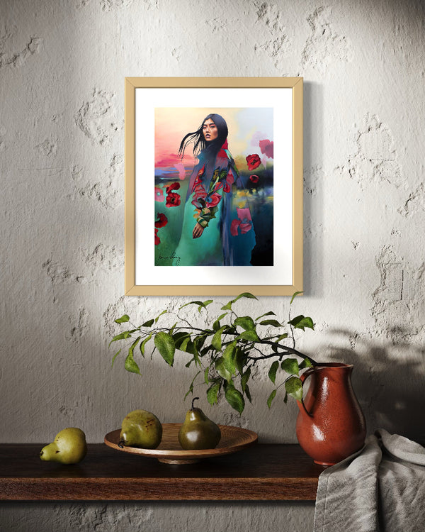 Framed artwork of a woman in a floral dress hanging on a textured wall with a shelf below.