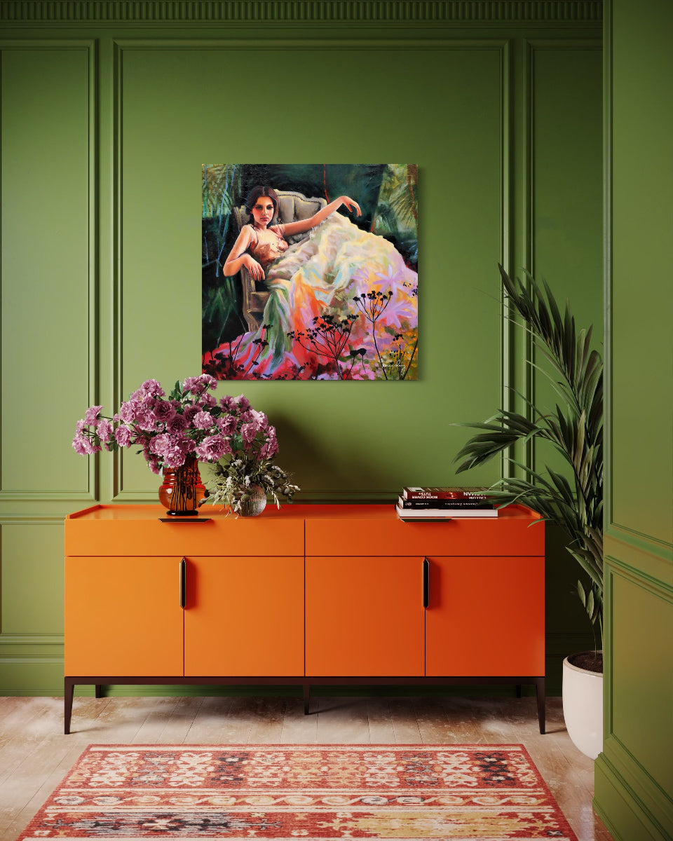 Orange cabinet against a green wall with a colorful painting above it, featuring a woman in a floral dress.