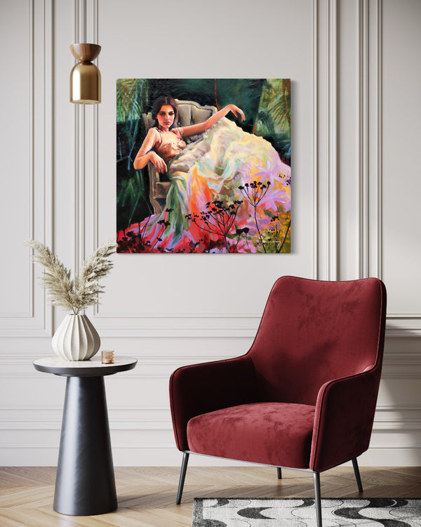 Modern interior with a red armchair, side table, and painting on the wall.