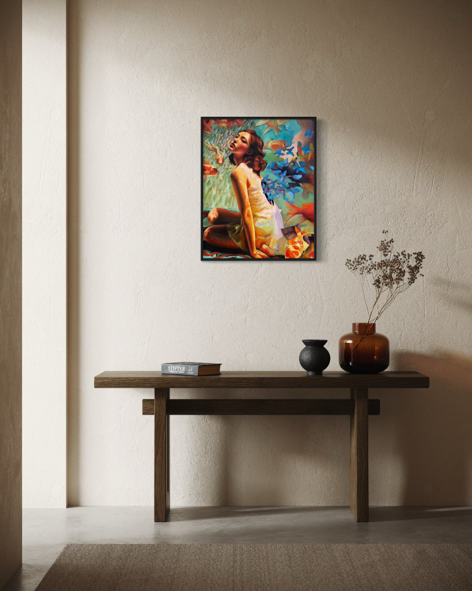 Framed artwork above a wooden console table with decorative items.