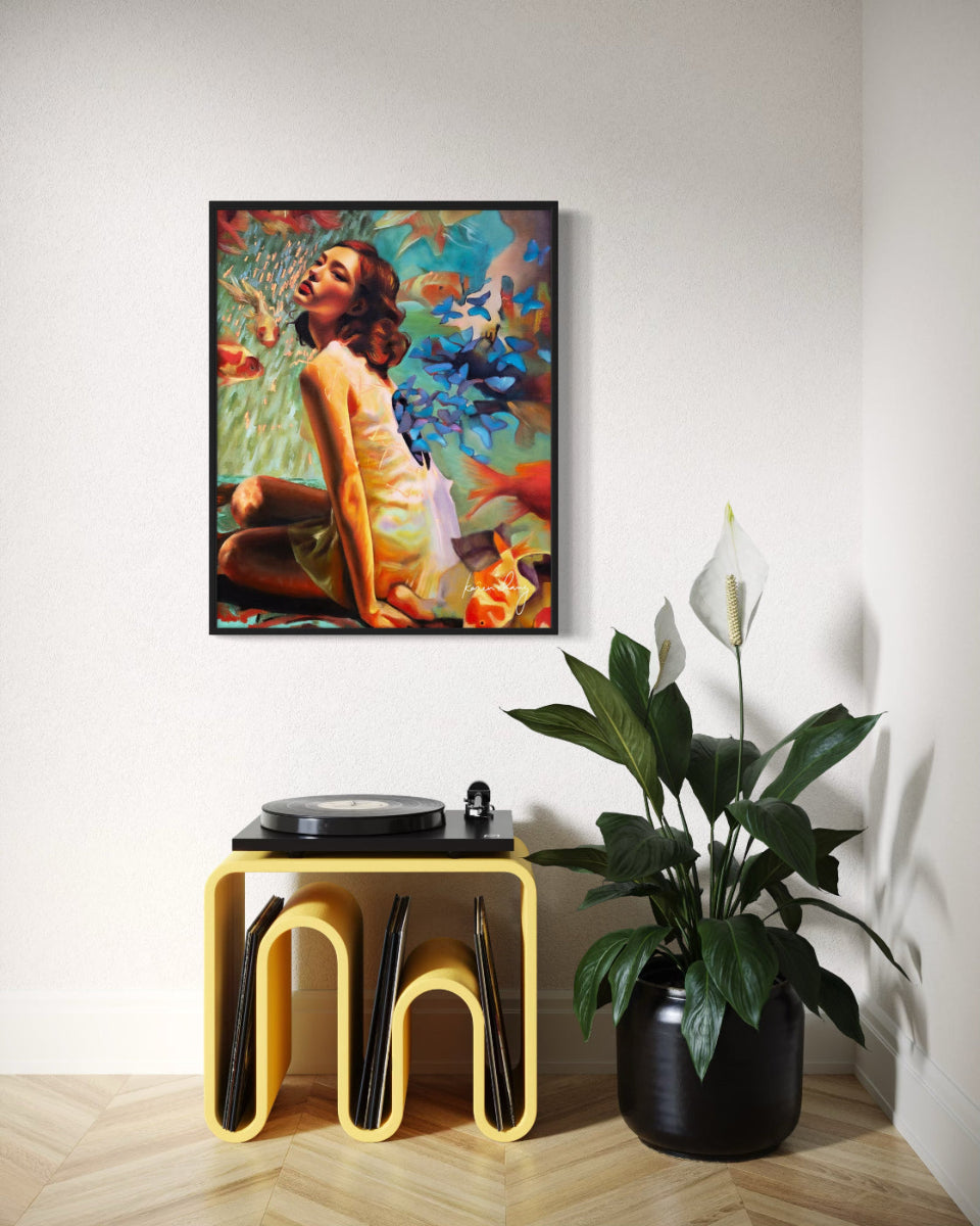 Framed abstract art on a wall above a yellow stool with vinyl records and a plant.